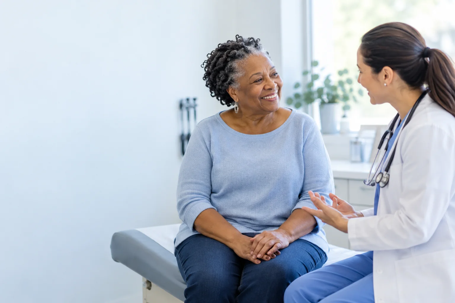 Illustrative scene of an older woman talking with a clinician